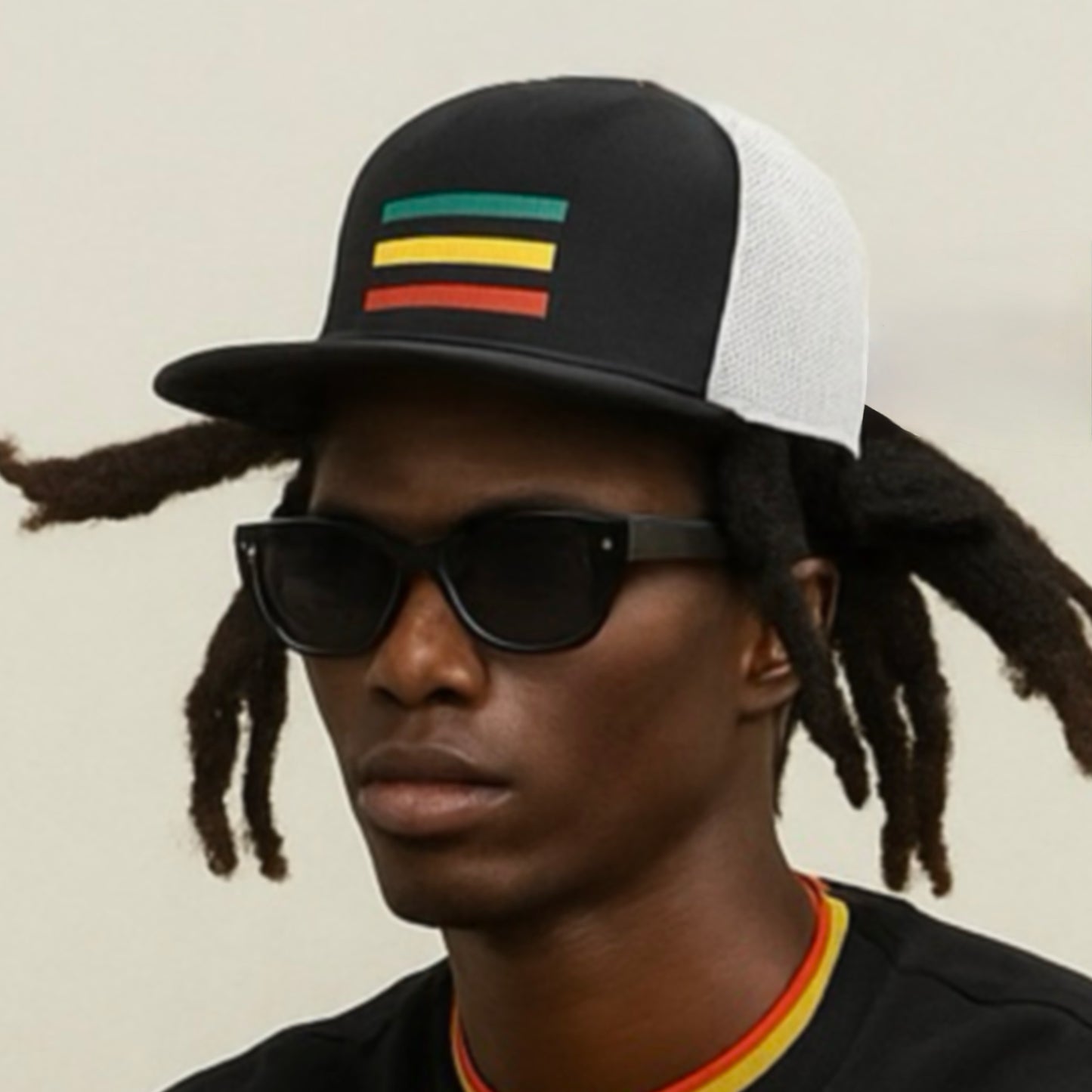 EMBROIDERED RASTA FLAG TRUCKER HAT