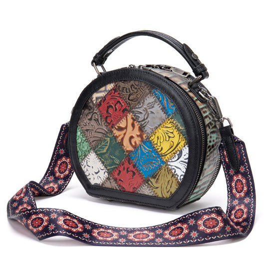 Round patchwork bag with a colorful strap on a white background